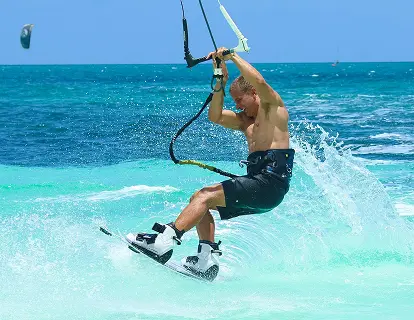 Kitesurfer in turquoise water