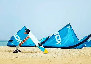 Kiteboarding equipment for rent on the beach